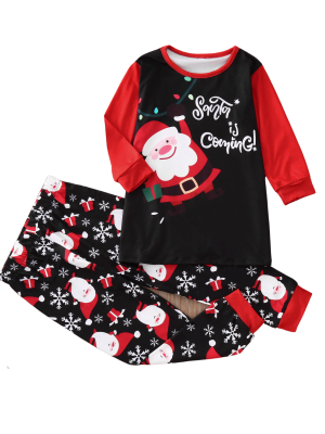 Pyjamas de Noel assortis couples de familles Le Pere Noel arrive modele enfant rouge noir